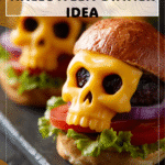 Creative Halloween Dinner Cheeseburger Skulls 4 Close-up of cheeseburger buns baked in festive skull design served on plate with Halloween props 2