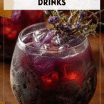 Drunk Witch: Spooky Halloween Cocktails for Adults 4 A purple witchy cocktail in a cauldron glass decorated for spooky Halloween beverages alcoholic. 2