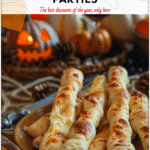 Easy Bread Bones for Potluck Halloween Dishes 4 Golden cheesy bread bones displayed on a party table for potluck Halloween dishes 2