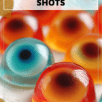 Fun Eyeball Jello Shots Recipe for Halloween 4 Fun Halloween eyeball Jello shots with quirky candy eye decorations on a tray. 2