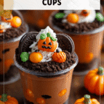Pumpkin Patch Dirt Cups: Spooky Halloween Desserts in a Cup! 4 Pumpkin patch dirt cups with cookie crumbs, candy pumpkins, and fun Halloween treats in a cup. 2