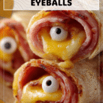 Savory Eyeballs with Cheese and Salami Wrap 4 Cheese eyeballs wrapped in salami served as Creepy Halloween Appetizers on a platter 2