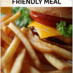 Toddler-Friendly Halloween Burger and Fries Plate 4 Spider burger with fries styled as a toddler Halloween food idea on a cutting board. 2