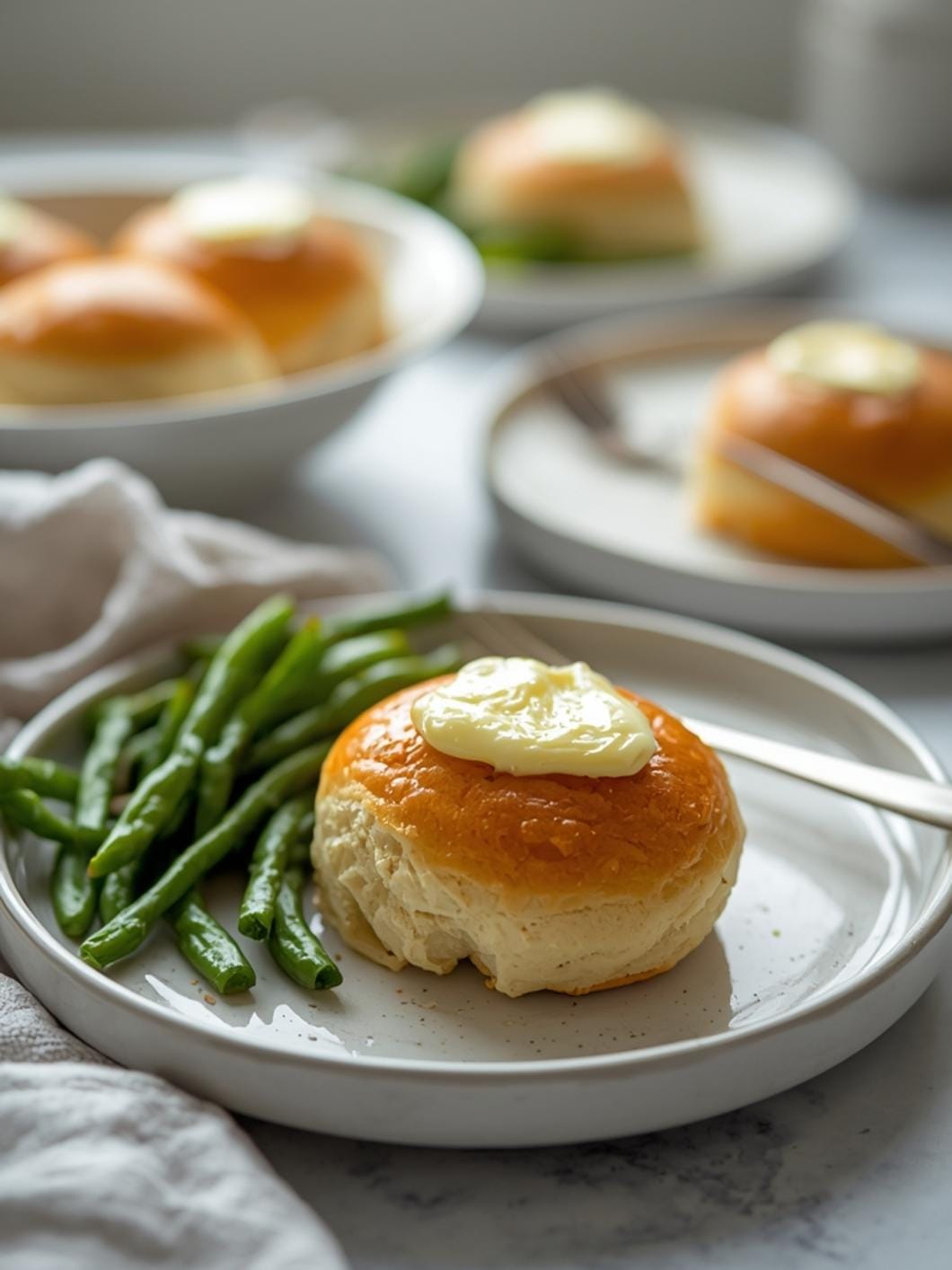 Soft Sourdough Dinner Rolls with Golden Butter Tops